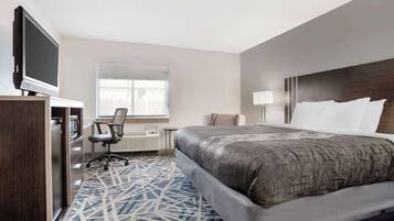 Desk, laptop workspace, blackout drapes, iron/ironing board