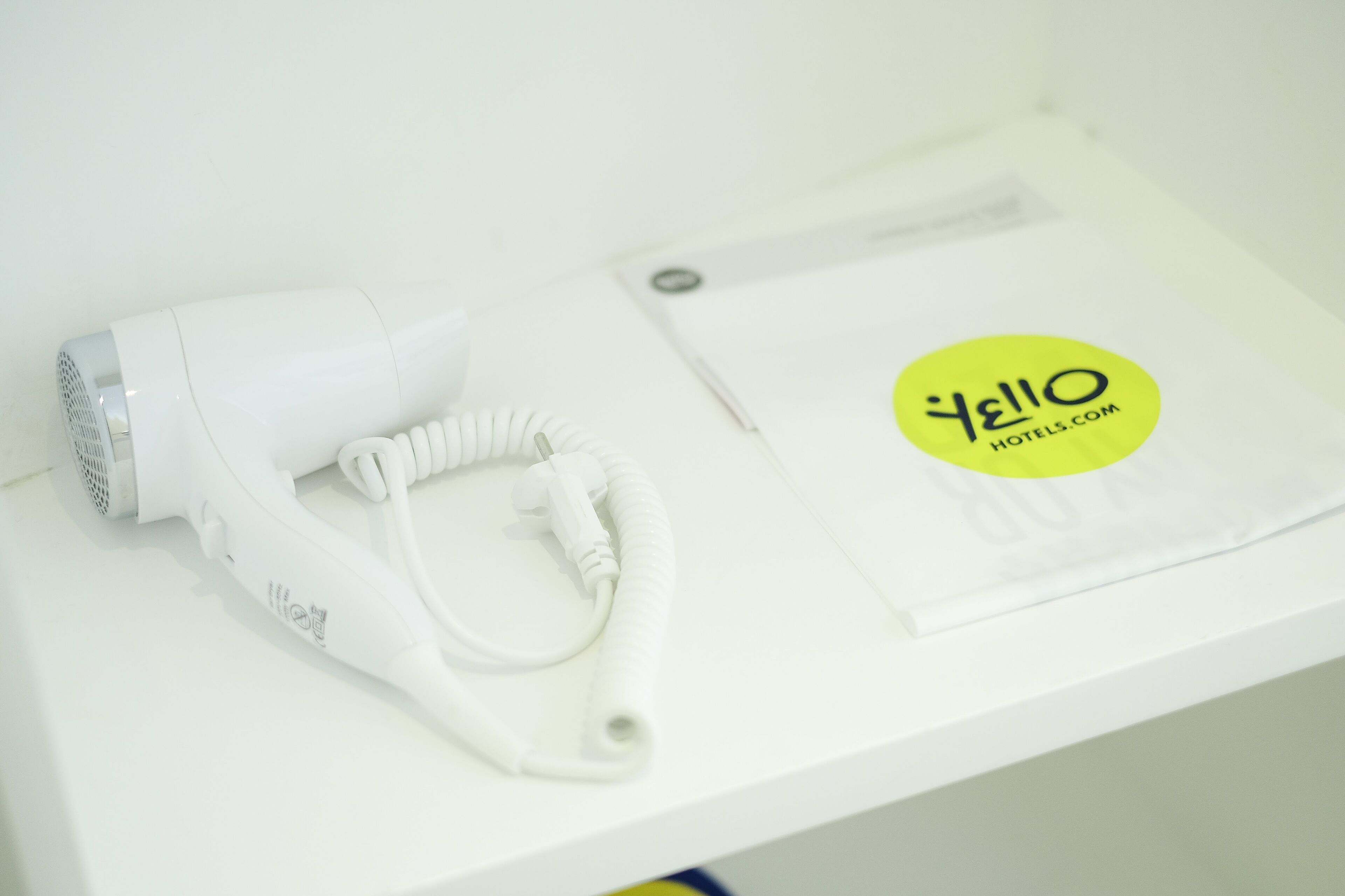 free toiletries, hair dryer, slippers, towels