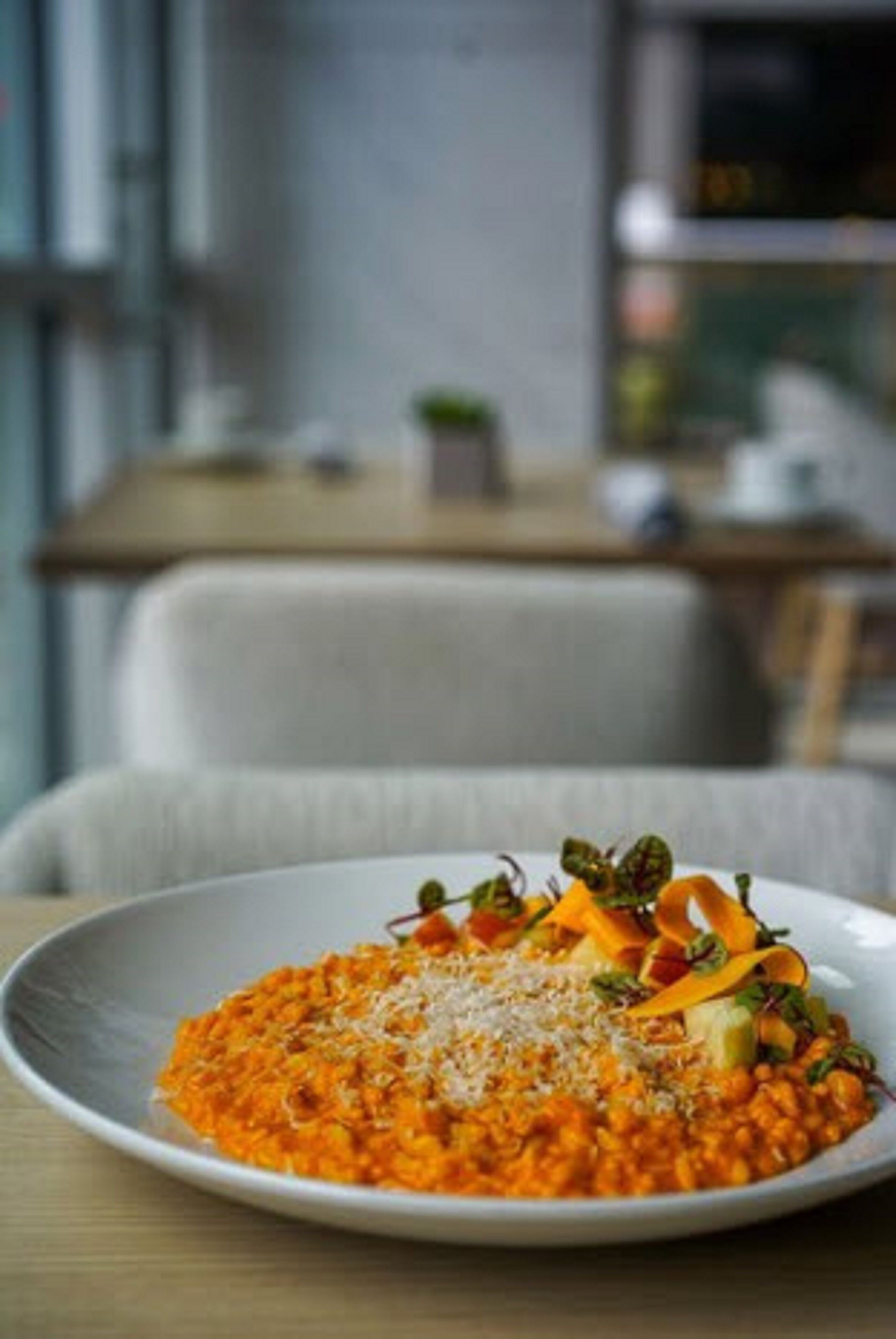 A plate of food on a table in a dining area.