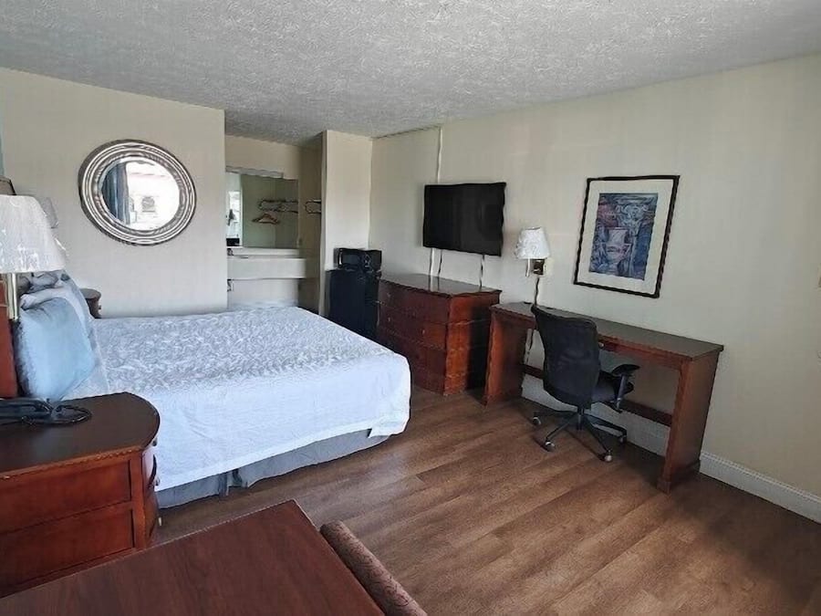 Quarto, 1 cama King, para não fumantes | Escrivaninha, Wi-Fi de cortesia, roupa de cama