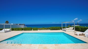 5 outdoor pools, an infinity pool, pool loungers