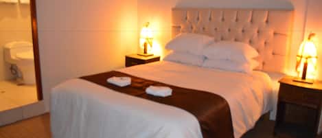 Egyptian cotton sheets, premium bedding, down duvets, pillow-top beds