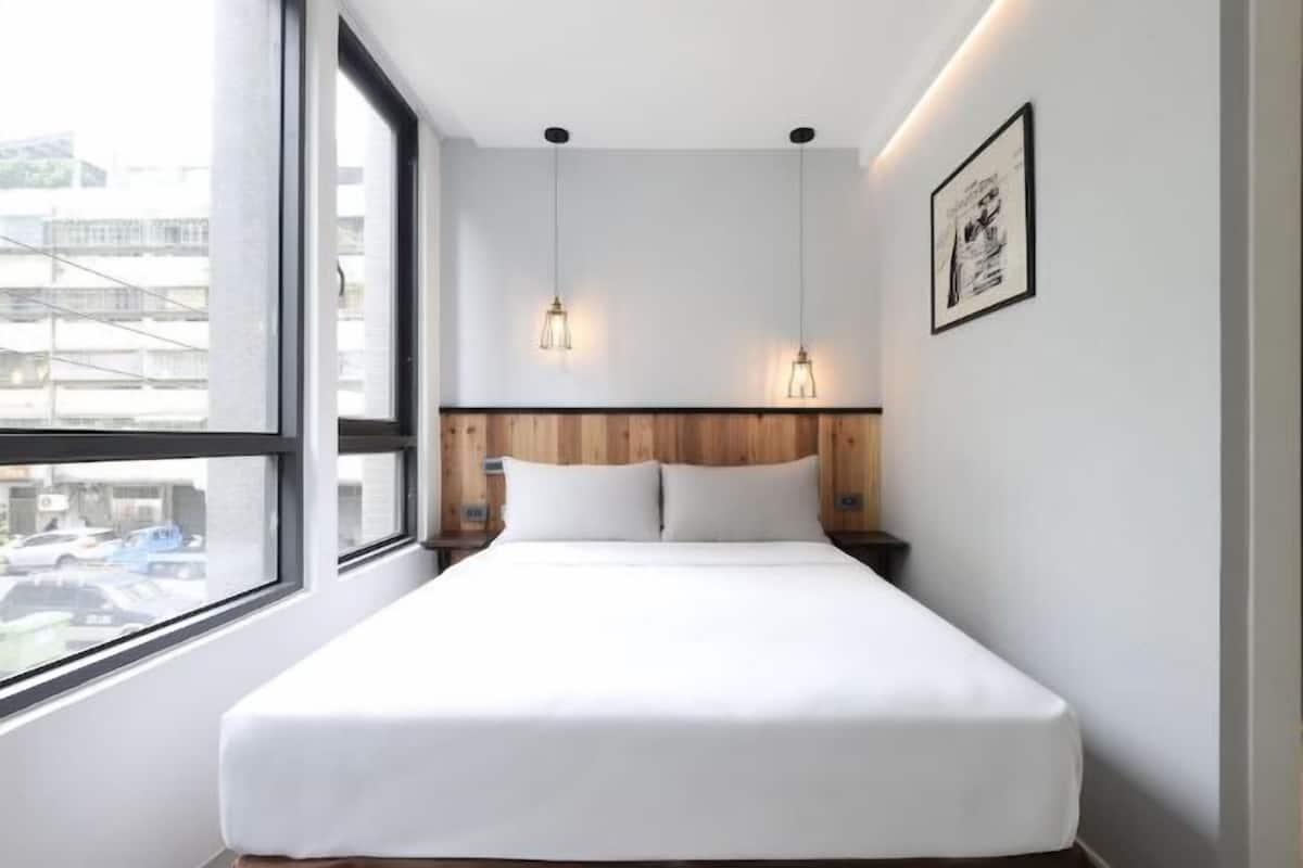 Premium bedding, desk, blackout curtains, soundproofing
