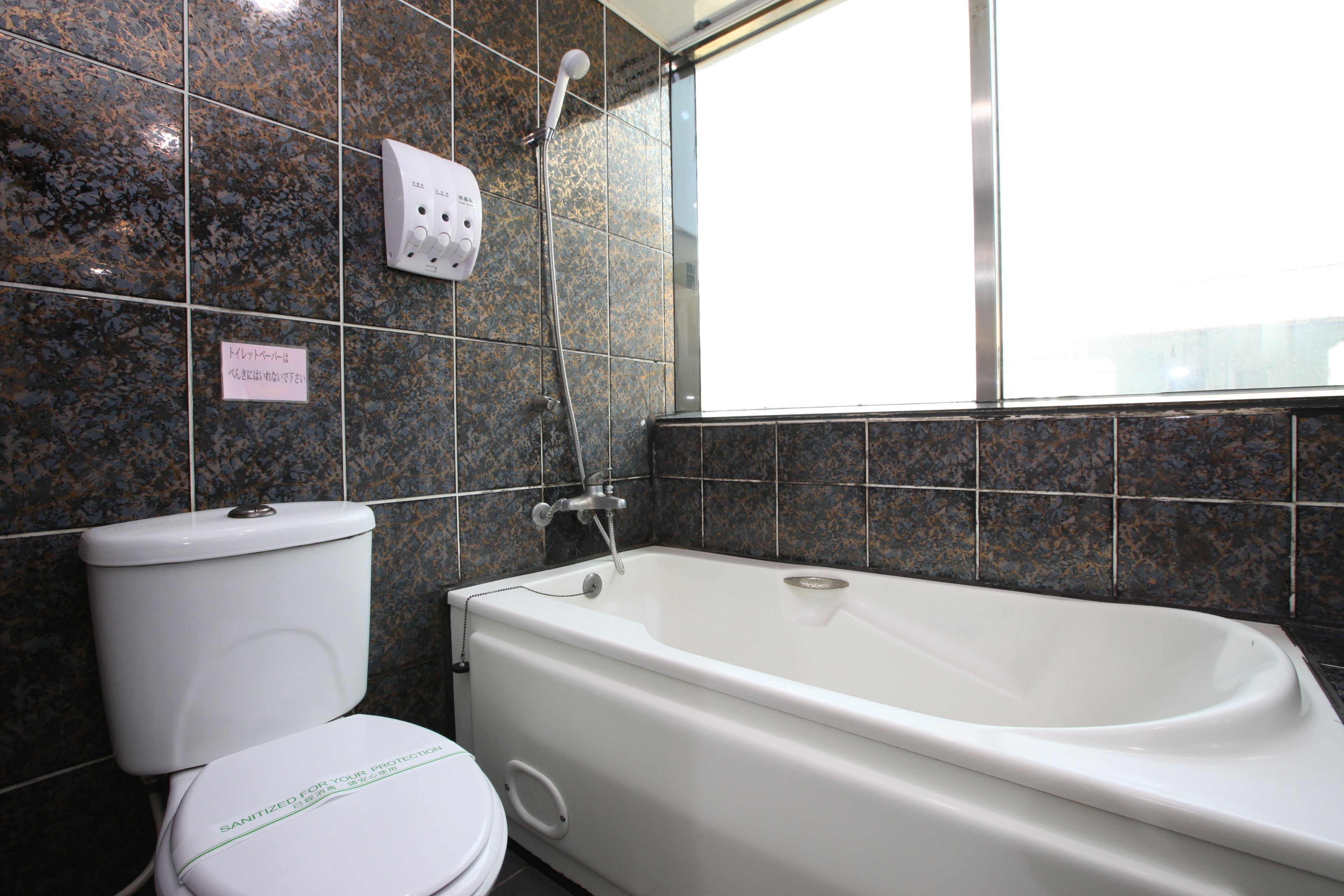 Deep-soaking bathtub, free toiletries, hair dryer, slippers