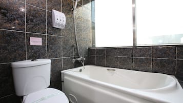 Deep-soaking bathtub, free toiletries, hair dryer, slippers