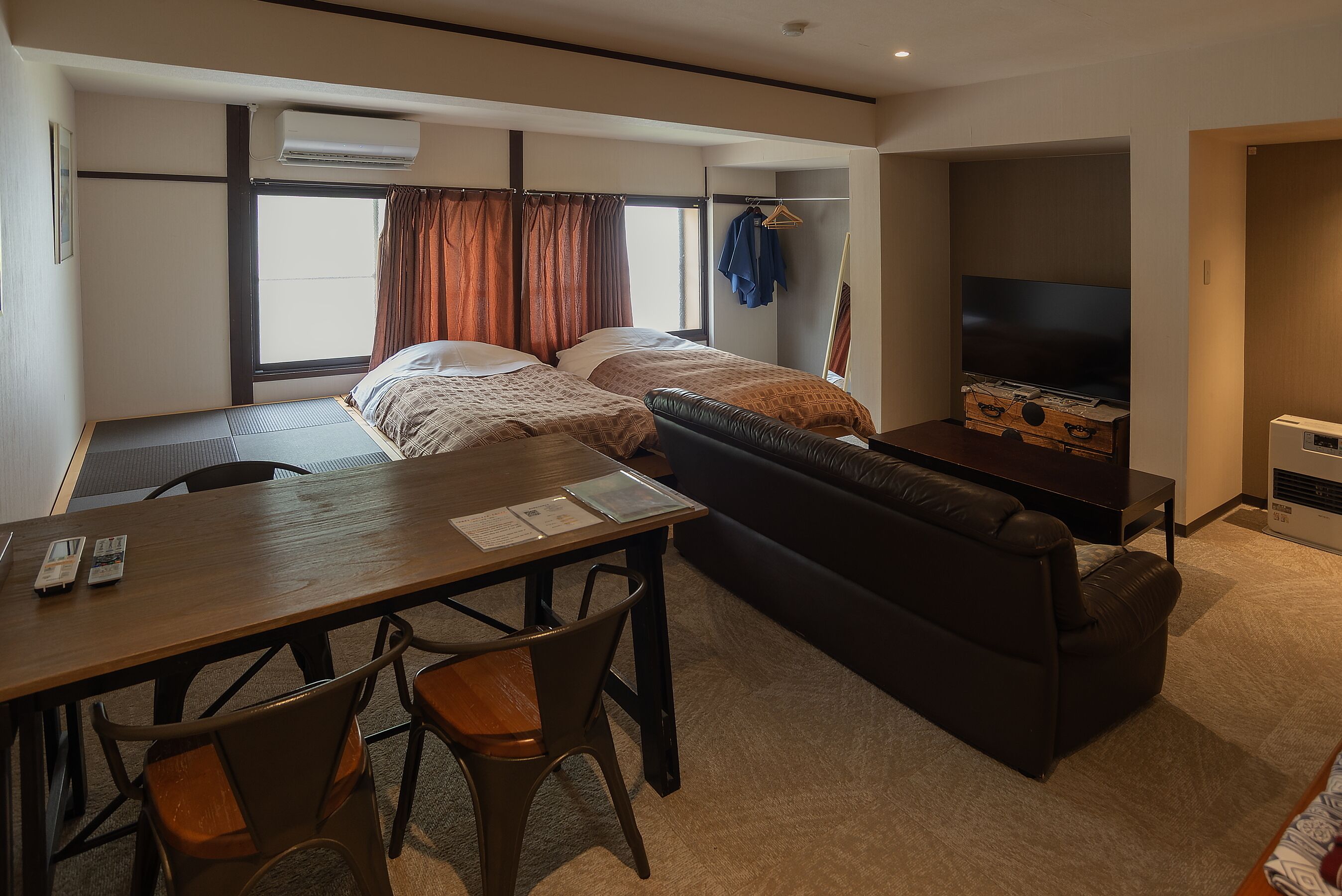 Type C Triple Room with Shower and Hot Spring, Non Smoking | Living area | 32-inch flat-screen TV with digital channels, TV