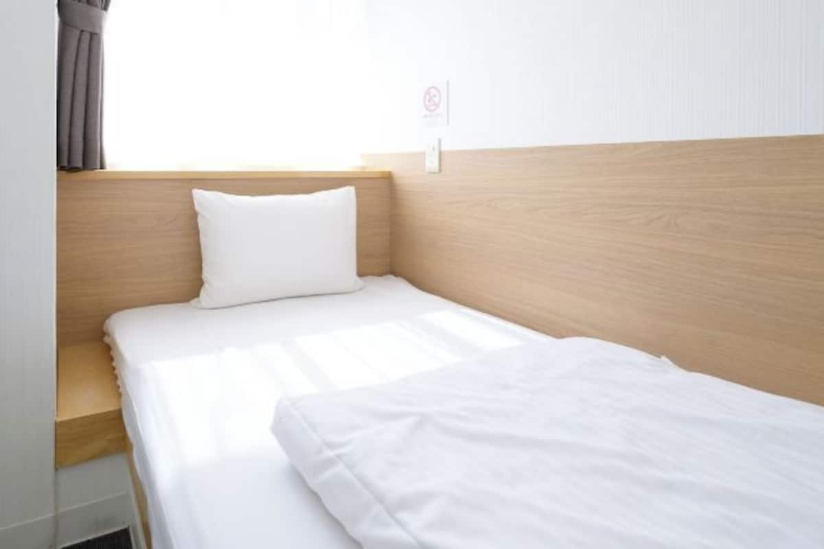 Blackout curtains, free WiFi, bed sheets