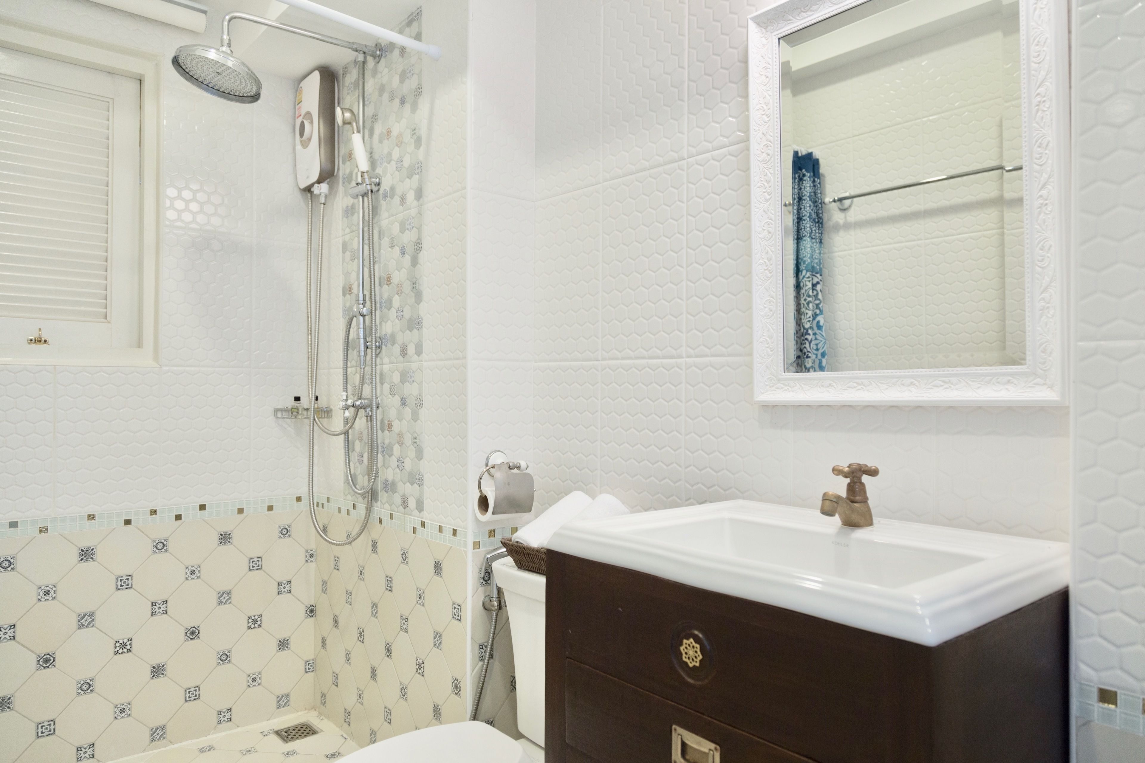 deluxe double bed  | bathroom | shower, rainfall showerhead, free toiletries, hair dryer