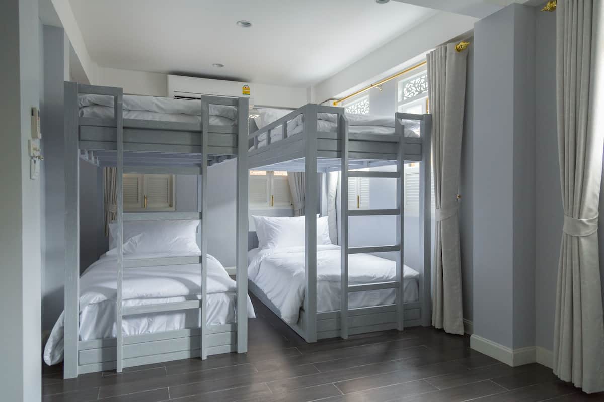 Deluxe Quadruple Room ( Friend ) | Desk, blackout drapes, free WiFi, bed sheets