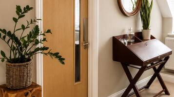 Deluxe Suite, 2 Bedrooms | Premium bedding, desk, iron/ironing board, free WiFi