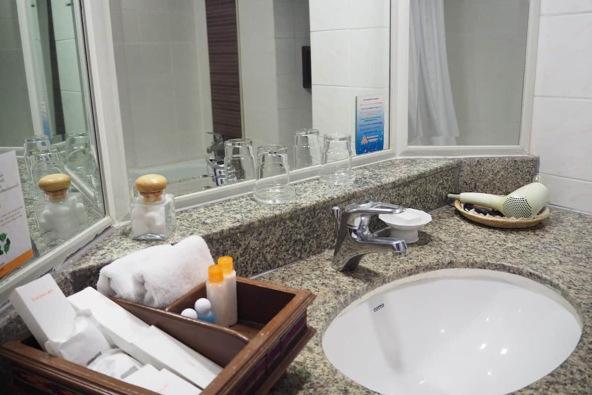 combined shower/bathtub, deep-soaking bathtub, designer toiletries