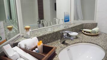 Combined shower/bathtub, deep-soaking bathtub, designer toiletries