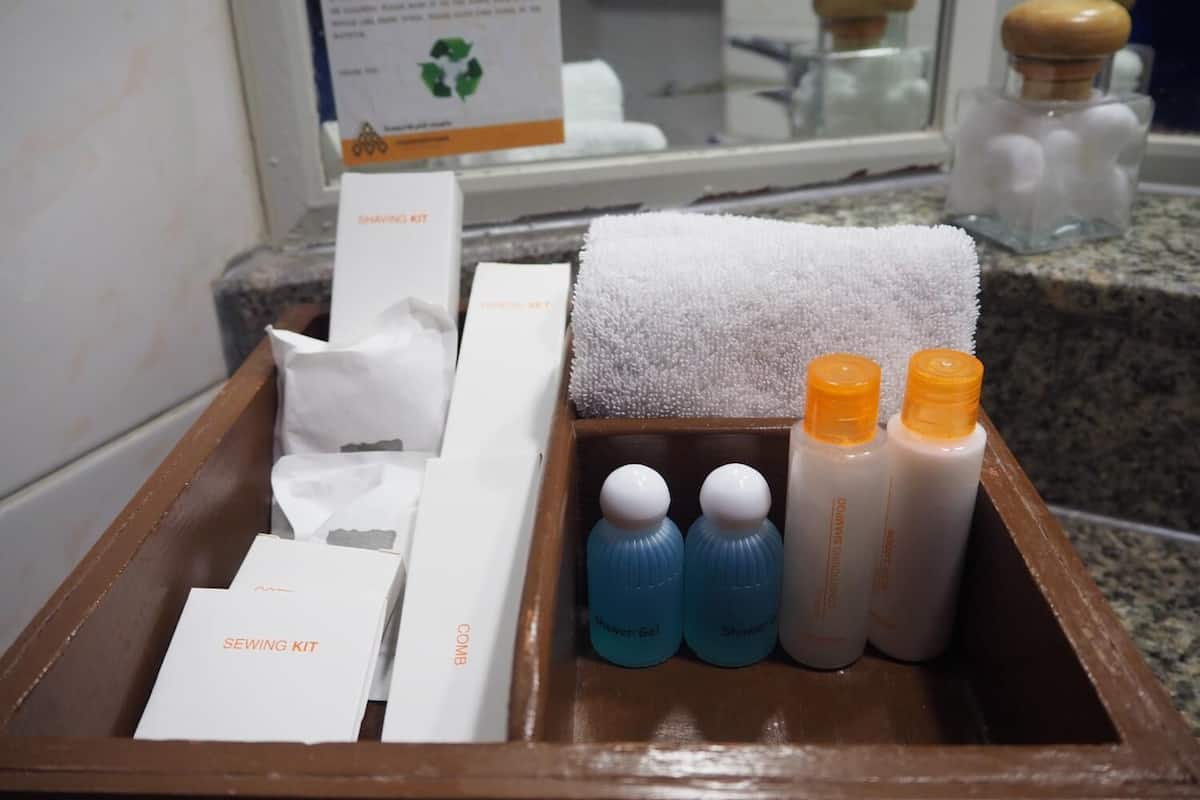 combined shower/bathtub, deep-soaking bathtub, designer toiletries