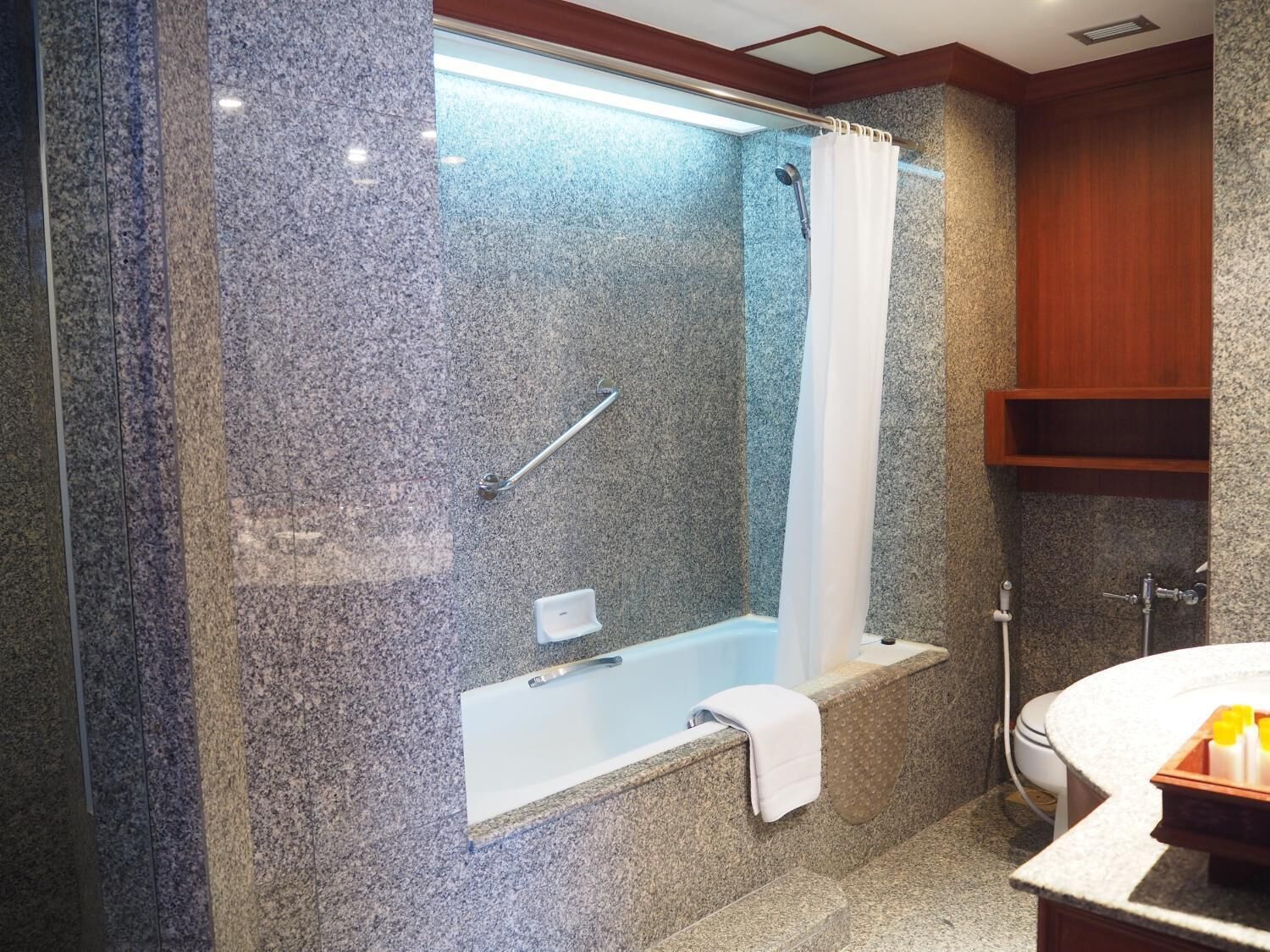 combined shower/bathtub, deep-soaking bathtub, designer toiletries