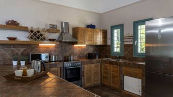 Villa, Beachfront (Tennis Court) | Private kitchen | Fridge, microwave, oven, stovetop