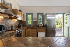 Villa, Beachfront (Tennis Court) | Private kitchen | Fridge, microwave, oven, stovetop