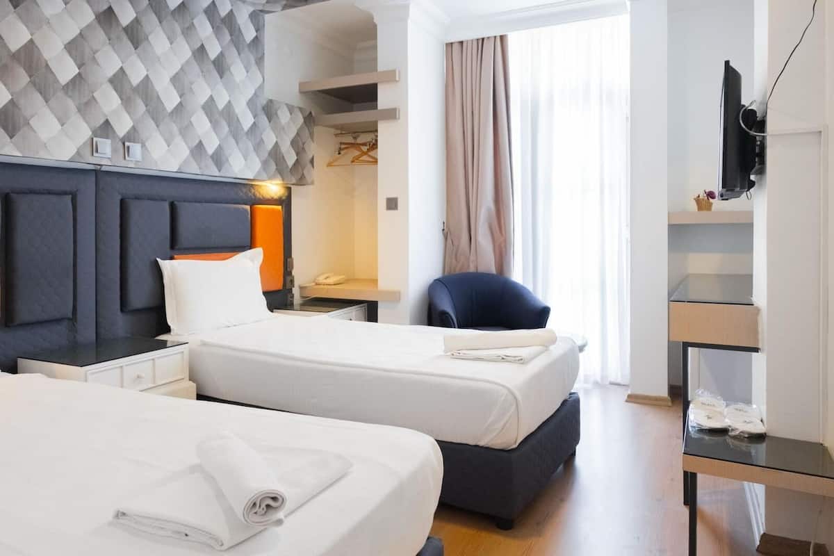 Economy Twin kamer | Een minibar, een bureau, geluiddichte muren, gratis wifi