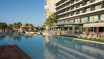 Seasonal outdoor pool, pool umbrellas, pool loungers