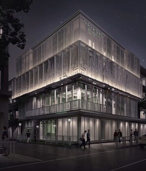Un edificio moderno con un letrero que dice "NARAWAD Boutique Hotel".