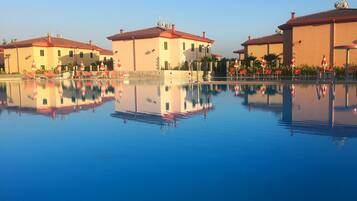 Seasonal outdoor pool, pool umbrellas, sun loungers