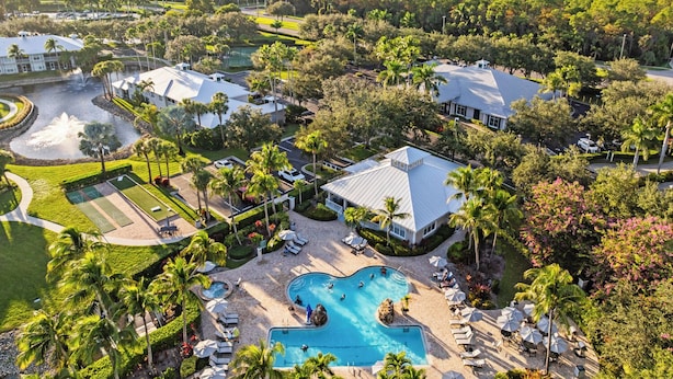 Aerial view - Solterra Vacation Rental: Luxury 3-BR Condo with Lake & Golf Views. Access to Luxury Pool, Hot Tub, and Golf Courses at Lely Resort. Close to Naples Beaches, 5th Avenue S, and Marco Island (Naples)