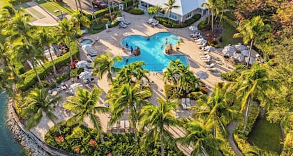 Asiago Vacation Rental at Lely Resort. Newly Furnished 2-Bedroom Condo with Stunning Lake & Golf Views. Spacious Retreat with Private Lanai, Resort Pool, Hot Tub and Gym Access