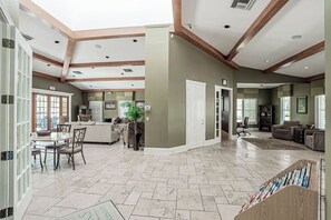 Lobby sitting area - Asiago Vacation Rental at Lely Resort. Newly Furnished 2-Bedroom Condo with Stunning Lake & Golf Views. Spacious Retreat with Private Lanai, Resort Pool, Hot Tub and Gym Access (Naples)