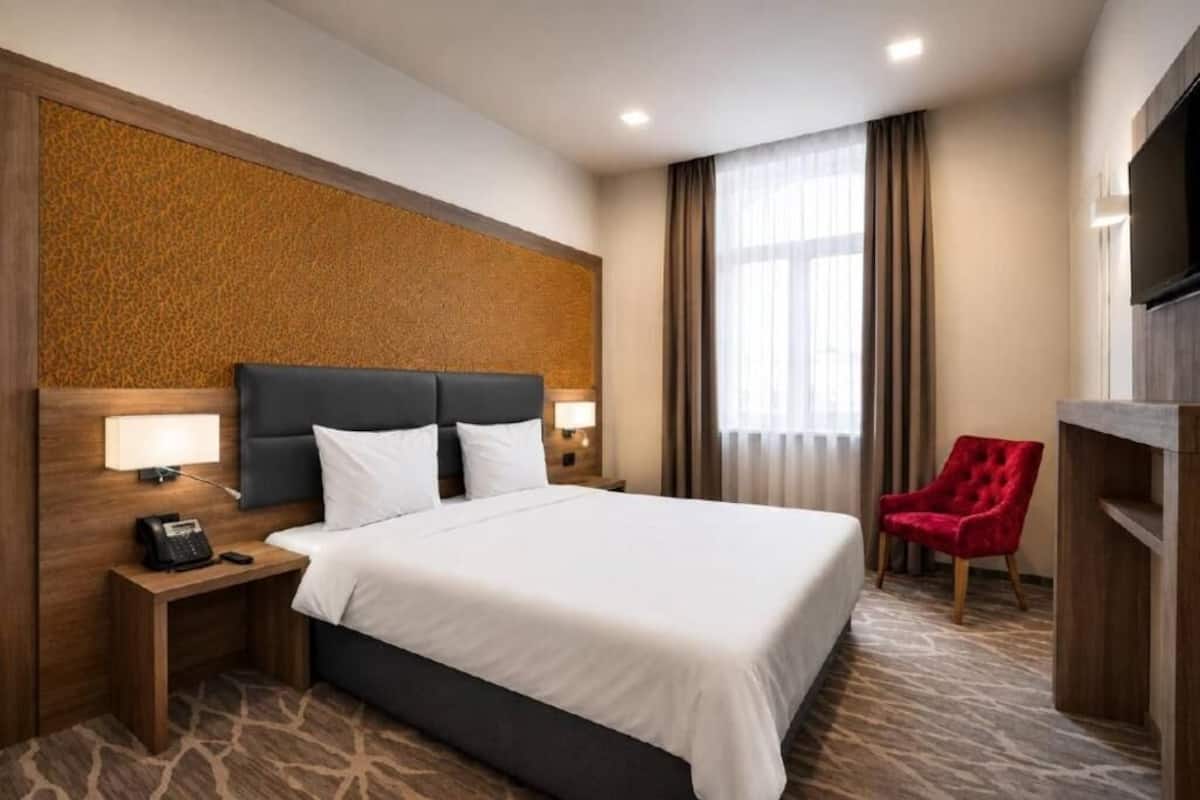 Habitación superior (Guest) | Ropa de cama de alta calidad y minibar