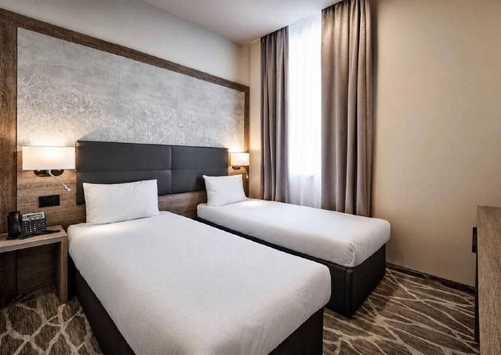 Ropa de cama de alta calidad y minibar 