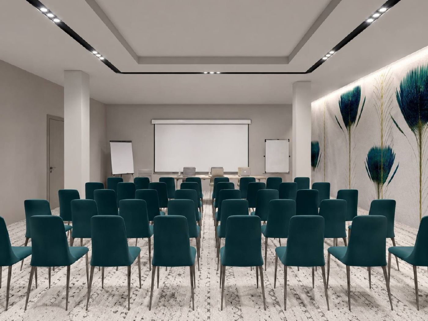 A conference room with rows of teal chairs, a whiteboard, and a projector screen.