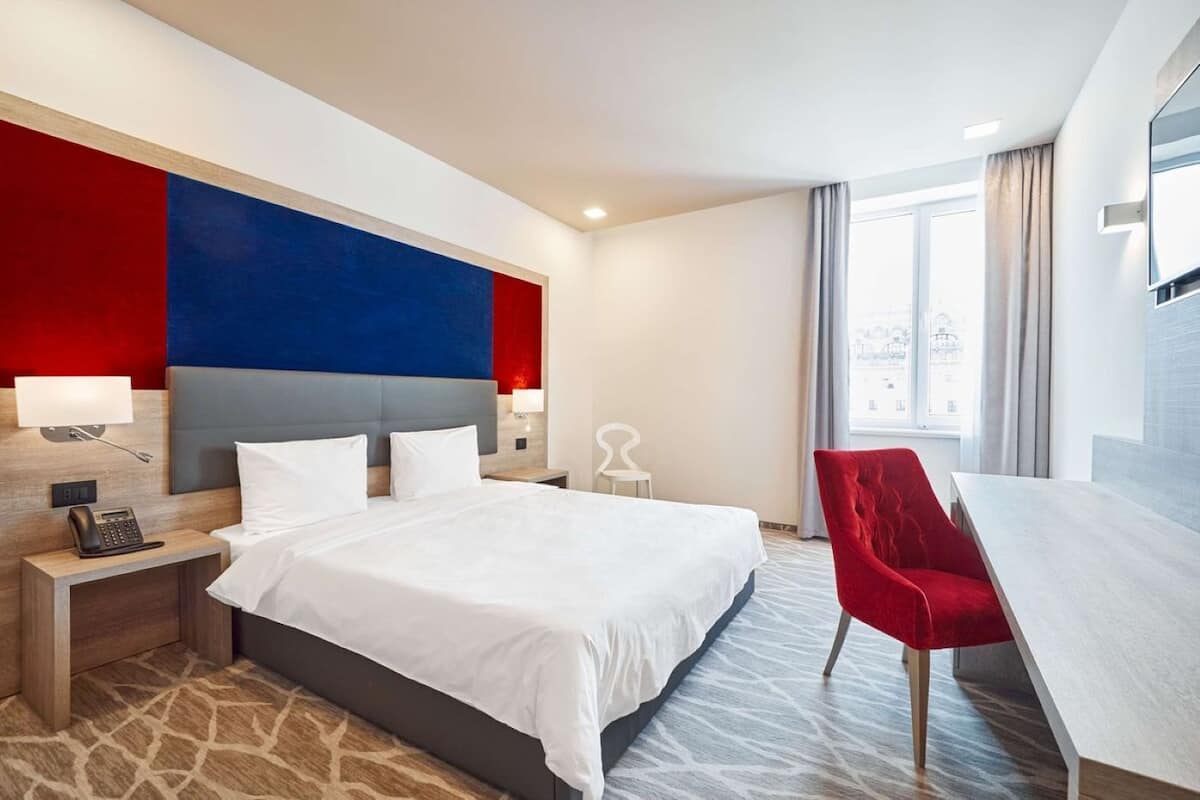 Habitación (Guest) | Ropa de cama de alta calidad y minibar