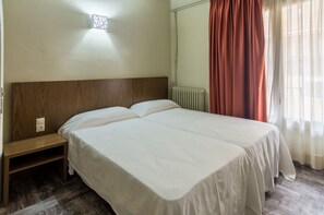 Desk, blackout drapes, rollaway beds, free WiFi