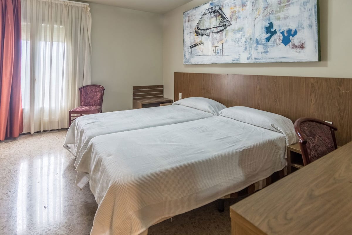 Desk, blackout drapes, rollaway beds, free WiFi