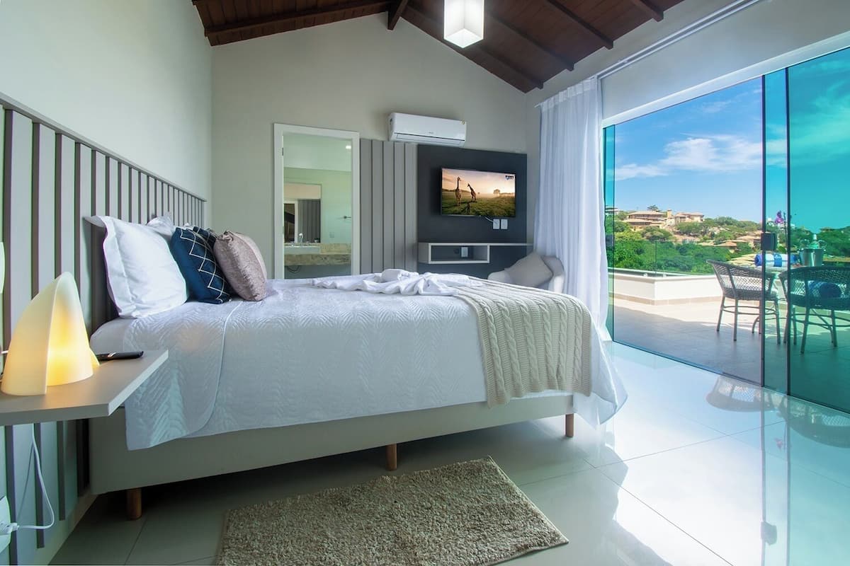 Phòng Suite Deluxe, 1 phòng ngủ, quang cảnh biển | Minibar, két bảo mật tại phòng, màn/rèm cản sáng, bộ trải giường