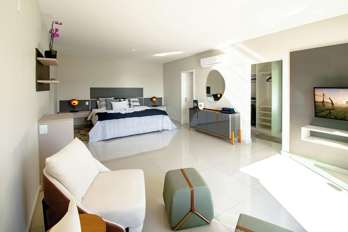 Phòng Suite Exclusive, 1 phòng ngủ, quang cảnh biển (Master) | Minibar, két bảo mật tại phòng, màn/rèm cản sáng, bộ trải giường