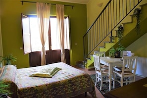 Apartment, 1 Bedroom | Desk, blackout curtains, cots/infant beds, rollaway beds - Bio Agriturismo Valle dei Calanchi (Castiglione in Teverina)