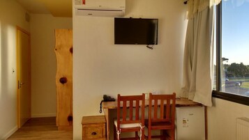 Quarto luxo | Sala de estar | TV LED