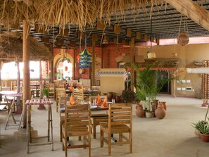 Breakfast, lunch, dinner served; local cuisine 