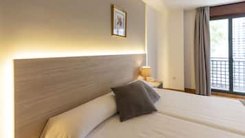 Desk, blackout curtains, free WiFi, bed sheets