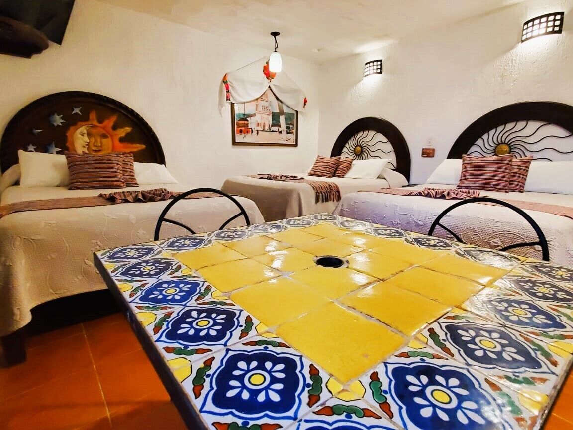 family room | 1 bedroom, blackout curtains, iron/ironing board, free wifi