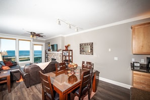 Condo, 2 Bedrooms, Ocean View, Beachfront | Living area | Flat-screen TV, fireplace, DVD player