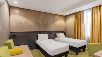 Standard Room, Multiple Beds | Minibar, in-room safe, desk, soundproofing