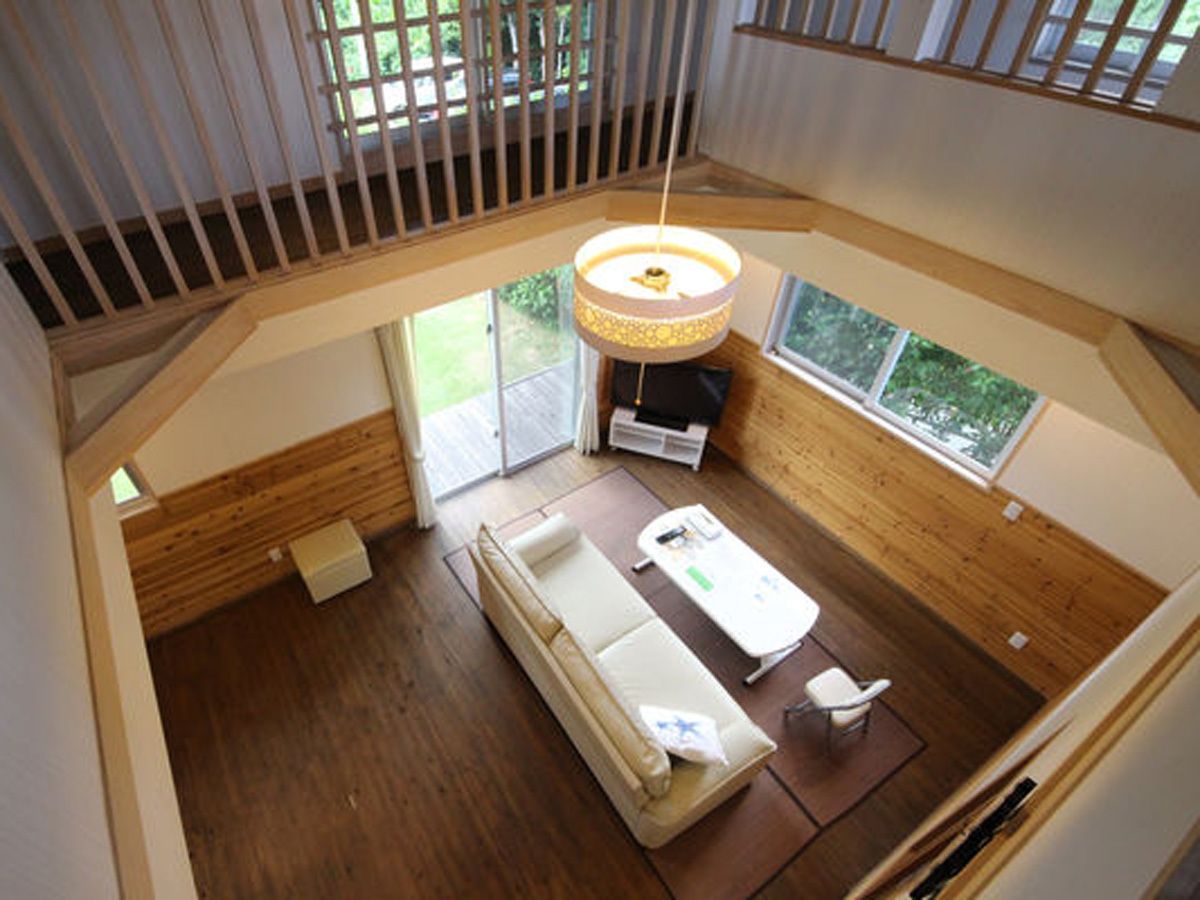 Room, 3 Bedrooms | Living room | Flat-screen TV