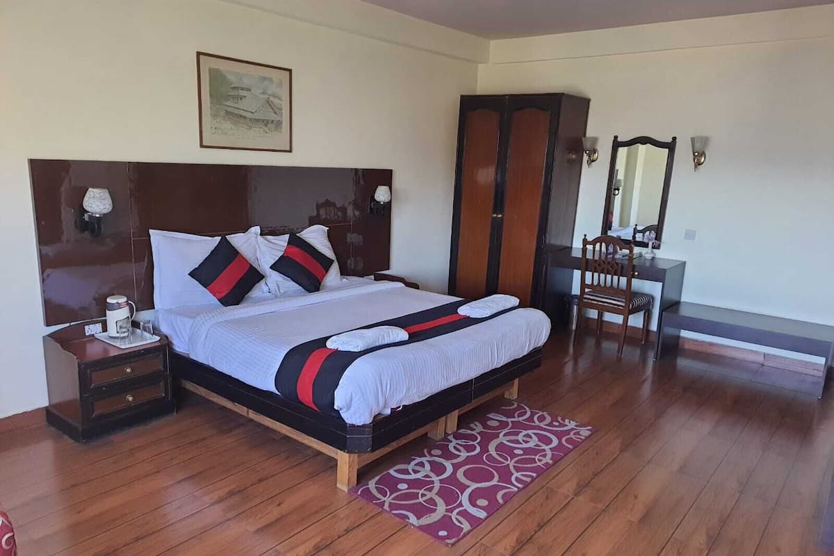 Ropa de cama de alta calidad, minibar y escritorio