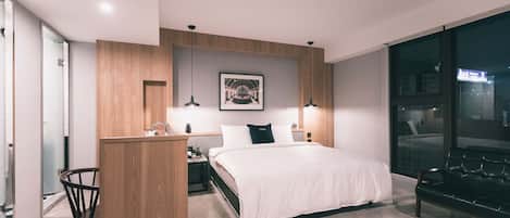 Habitación doble Deluxe | Ropa de cama de alta calidad y caja de seguridad en la habitación