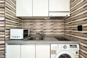 Tomannsrom – exclusive, byutsikt | Eget kjøkken | Kjøleskap på fellesområdet, mikrobølgeovn på fellesområdet og vannkoker