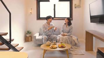 Deluxe Duplex, City View | Hypo-allergenic bedding, down comforters, free minibar