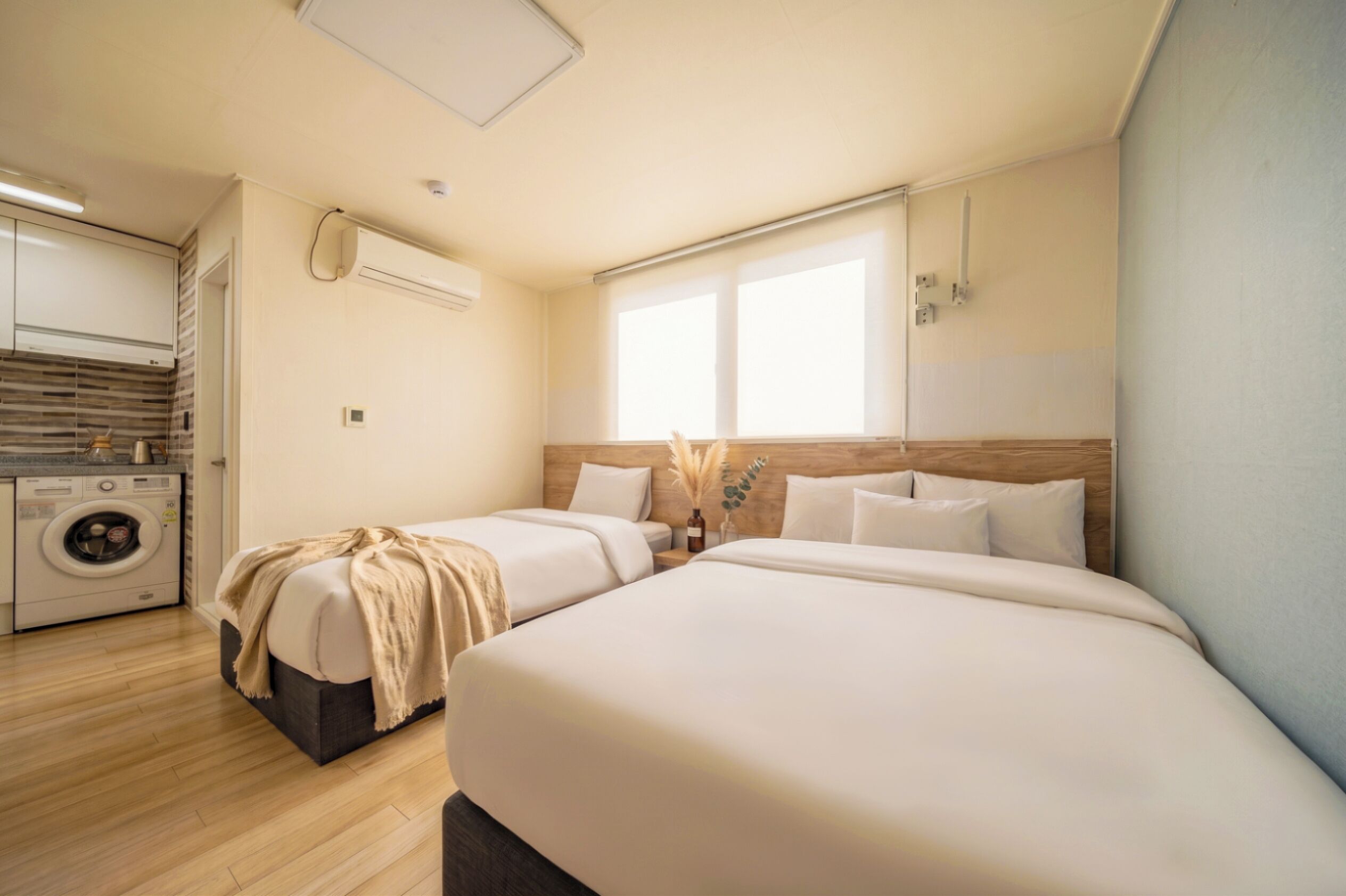Chambre exclusive avec lits jumeaux, vue sur la ville | Literie hypoallergénique, couette en duvet, articles de minibar gratuits