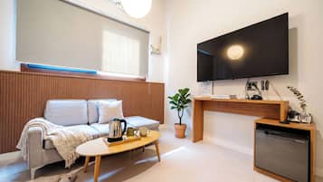 Hypo-allergenic bedding, down comforters, free minibar