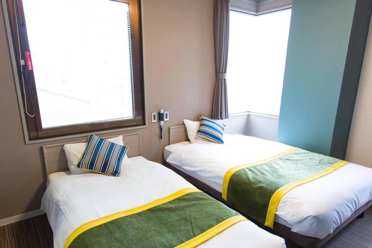 Twin Room, Non Smoking | WiFi (free), bed sheets